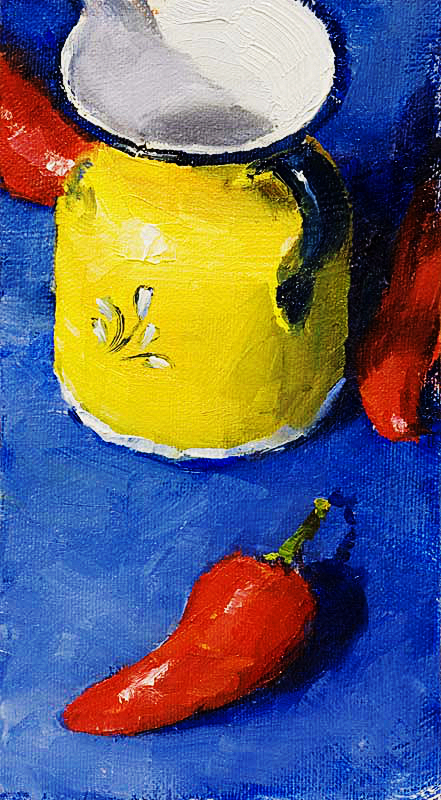 Still life oil painting of a yellow, white and blue pitcher surrounded by three bright red peppers on a deep blue background.